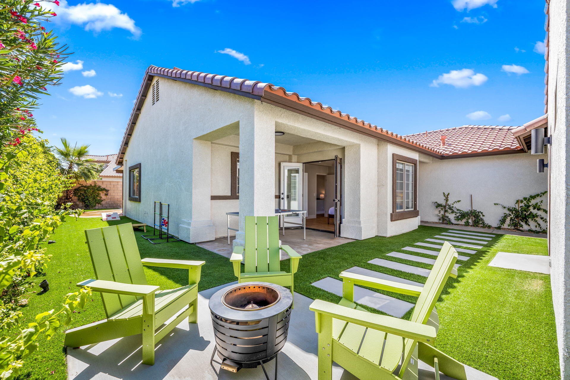 48674 Gibraltar Street Indio, CA 92201 - Photo 7 of 49 a view of an house with backyard and patio