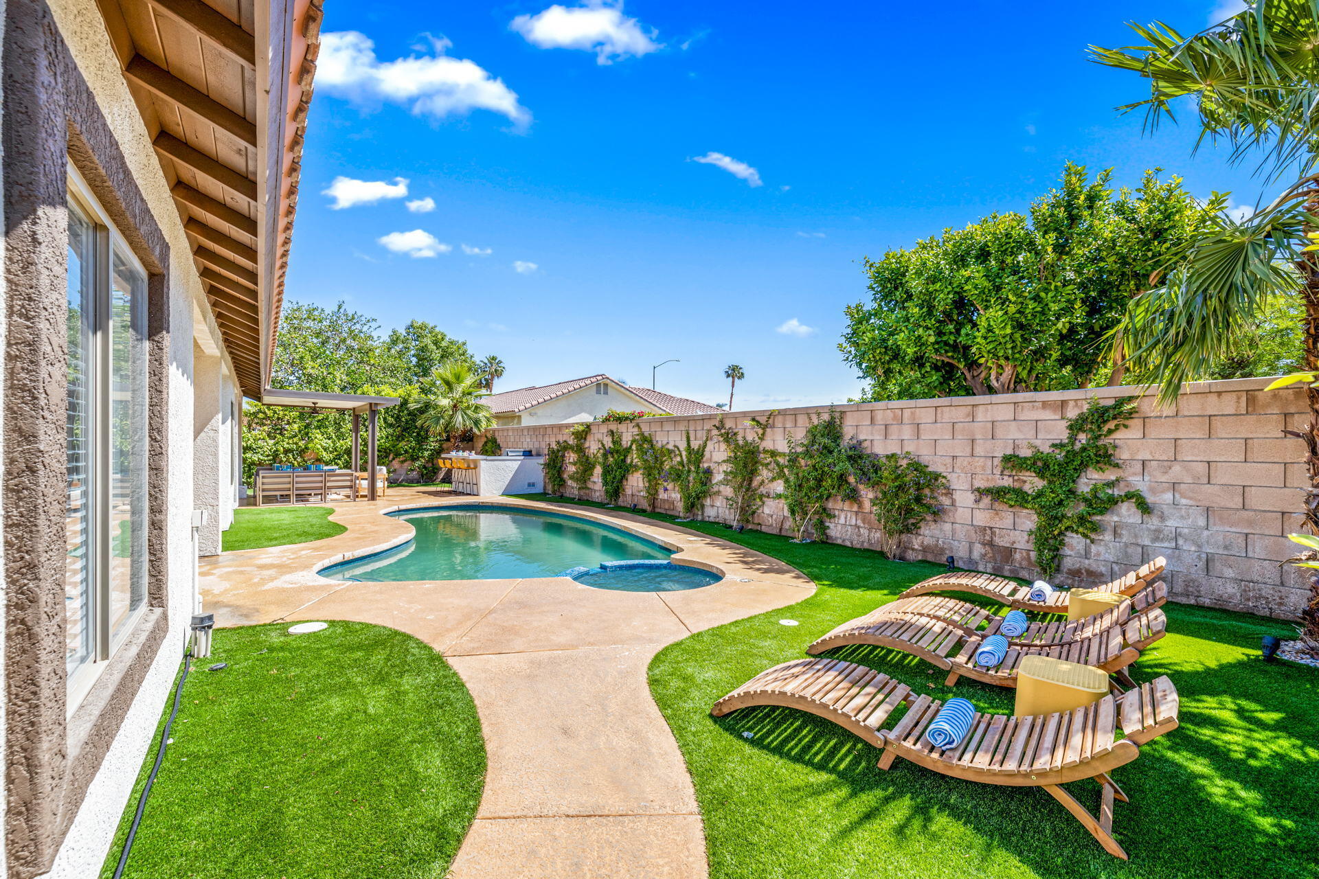 48674 Gibraltar Street Indio, CA 92201 - Photo 10 of 49 a view of swimming pool with outdoor seating