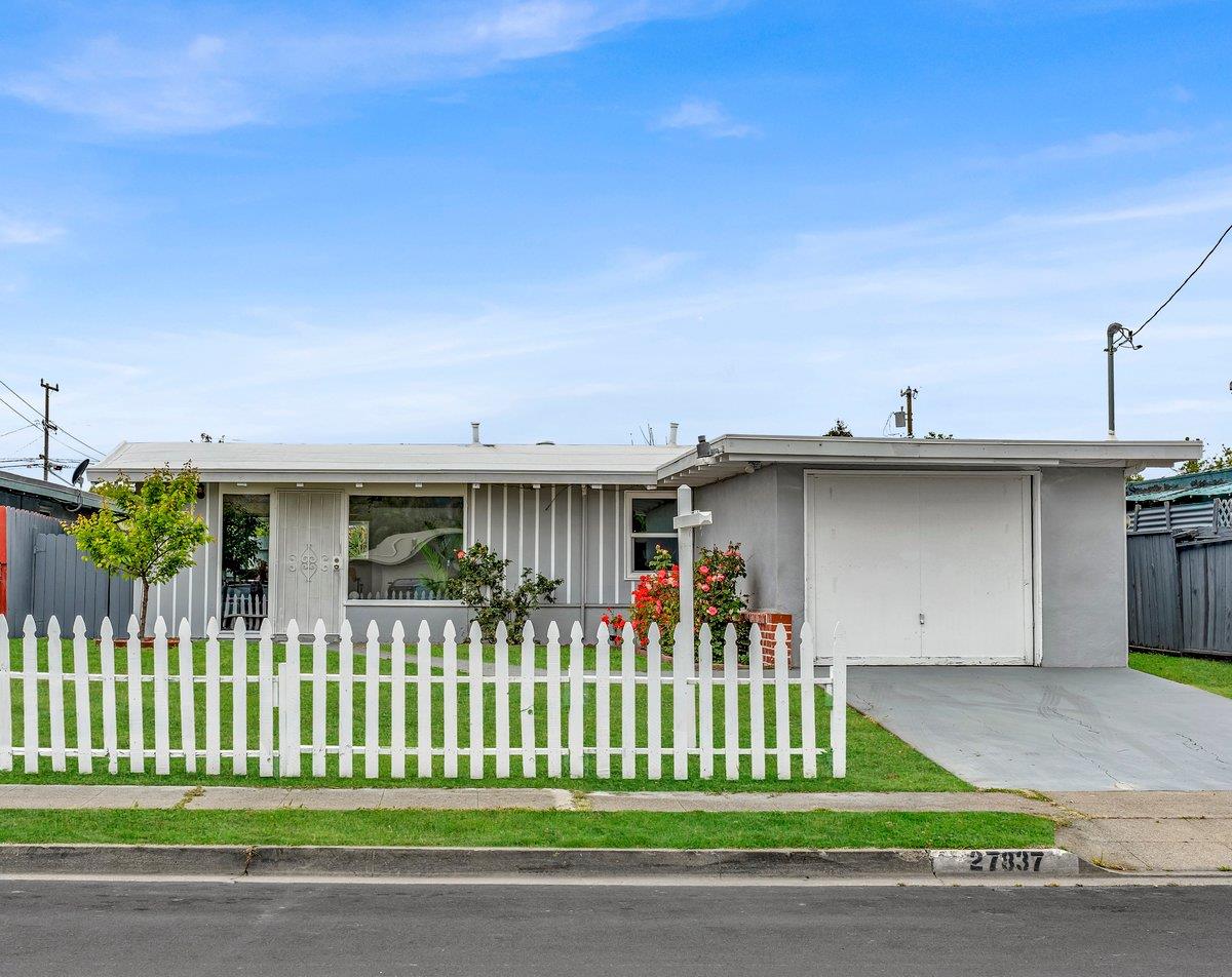 a view of a house with a deck