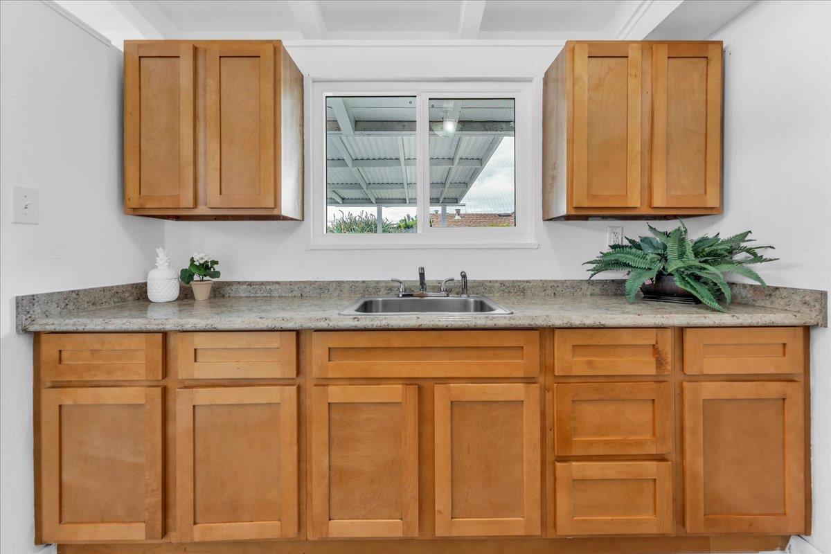 27837 Ormond Avenue Hayward, CA 94544 - Photo 11 of 26 a bathroom with a sink and a mirror