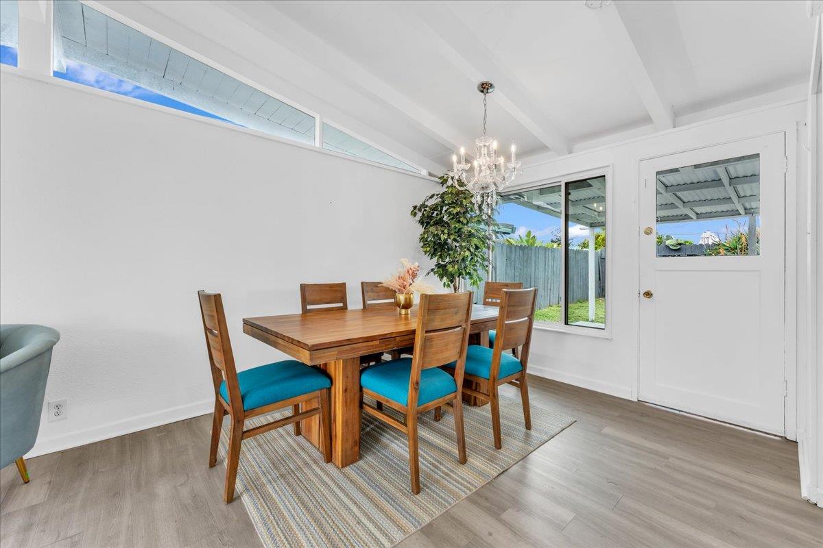 27837 Ormond Avenue Hayward, CA 94544 - Photo 13 of 26 a dining room with furniture potted plants and wooden floor