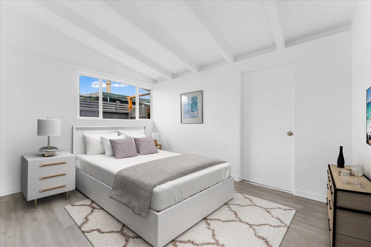 27837 Ormond Avenue Hayward, CA 94544 - Photo 16 of 26 a bedroom with a bed and a window