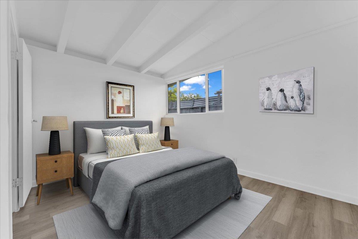 27837 Ormond Avenue Hayward, CA 94544 - Photo 18 of 26 a bedroom with a bed and wall painting