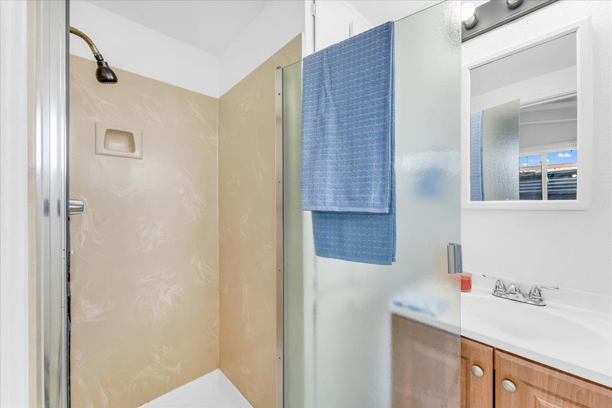 27837 Ormond Avenue Hayward, CA 94544 - Photo 20 of 26 a bathroom with a sink and a mirror
