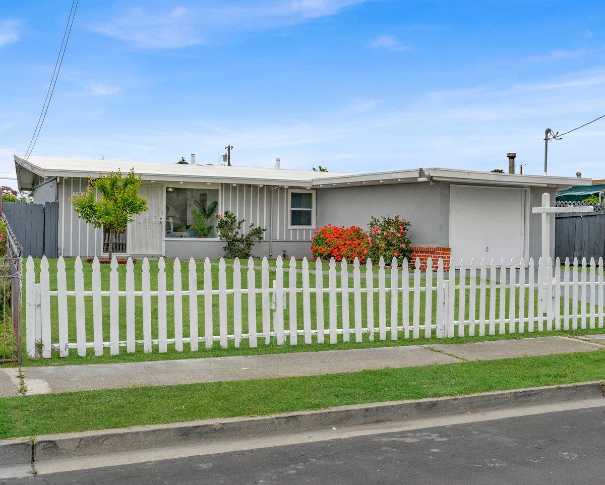 27837 Ormond Avenue Hayward, CA 94544 - Photo 2 of 26 a front view of a house with a garden and plants