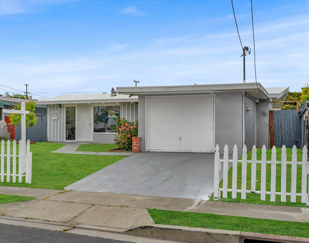 27837 Ormond Avenue Hayward, CA 94544 - Photo 3 of 26 a front view of a house with a yard
