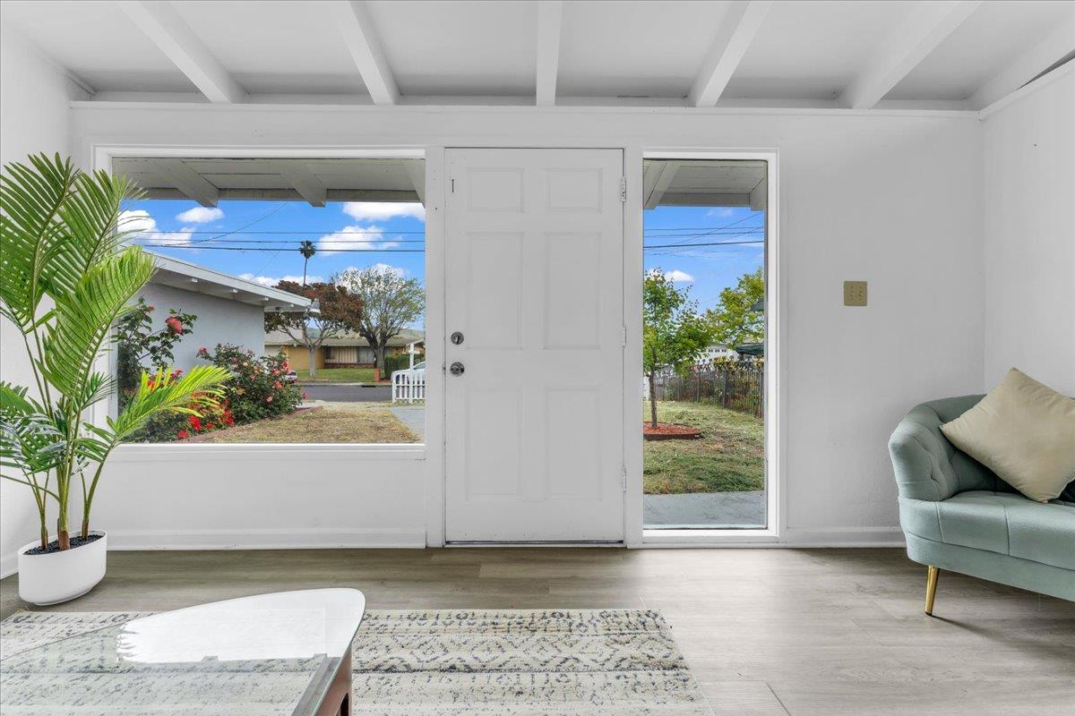 27837 Ormond Avenue Hayward, CA 94544 - Photo 8 of 26 a living room with furniture and a potted plant