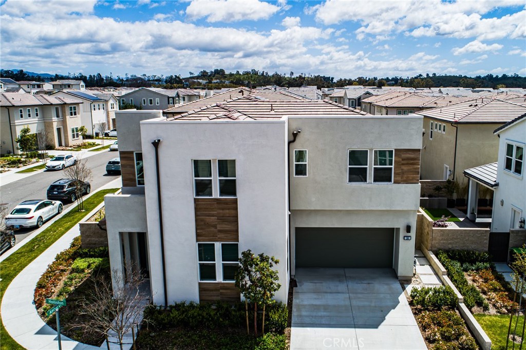 260 Holliston Lake Forest, CA 92630 - Photo 1 of 63 a view of a house with many windows
