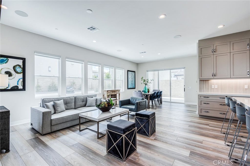 260 Holliston Lake Forest, CA 92630 - Photo 17 of 63 a living room with furniture and a wooden floor