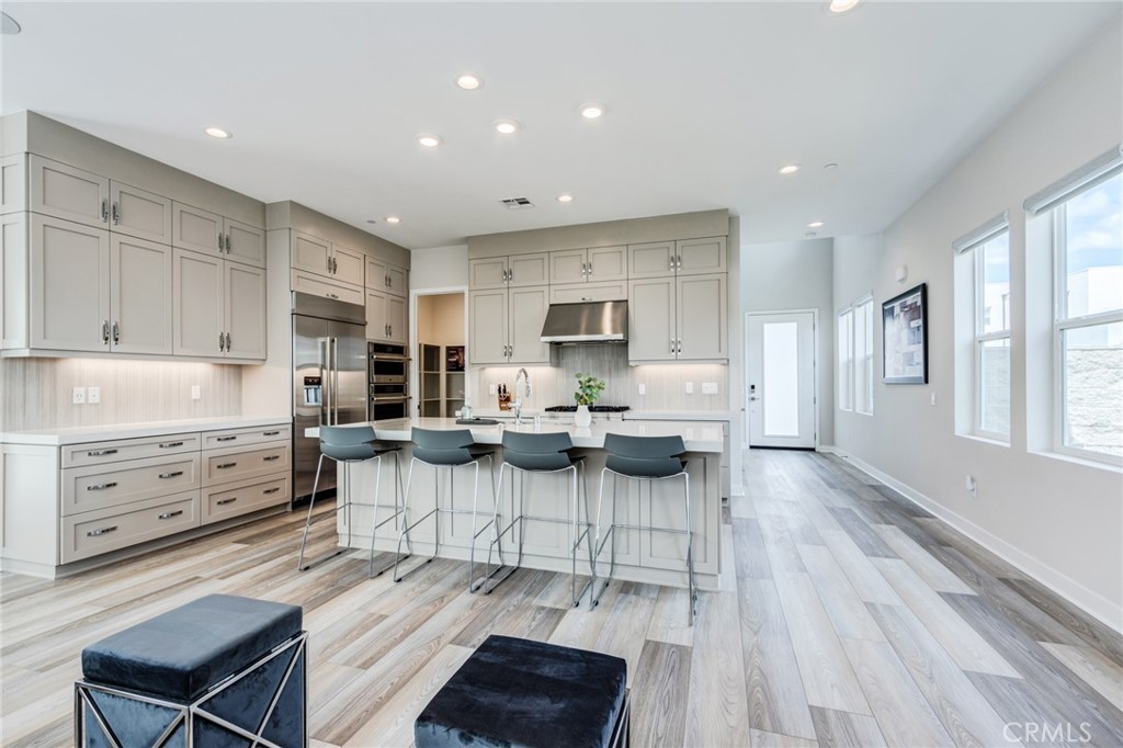 260 Holliston Lake Forest, CA 92630 - Photo 20 of 63 a living room with furniture and a wooden floor
