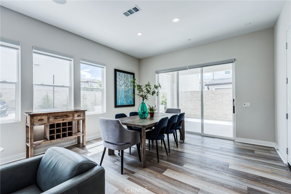 260 Holliston Lake Forest, CA 92630 - Photo 21 of 63 a dining room with furniture and wooden floor