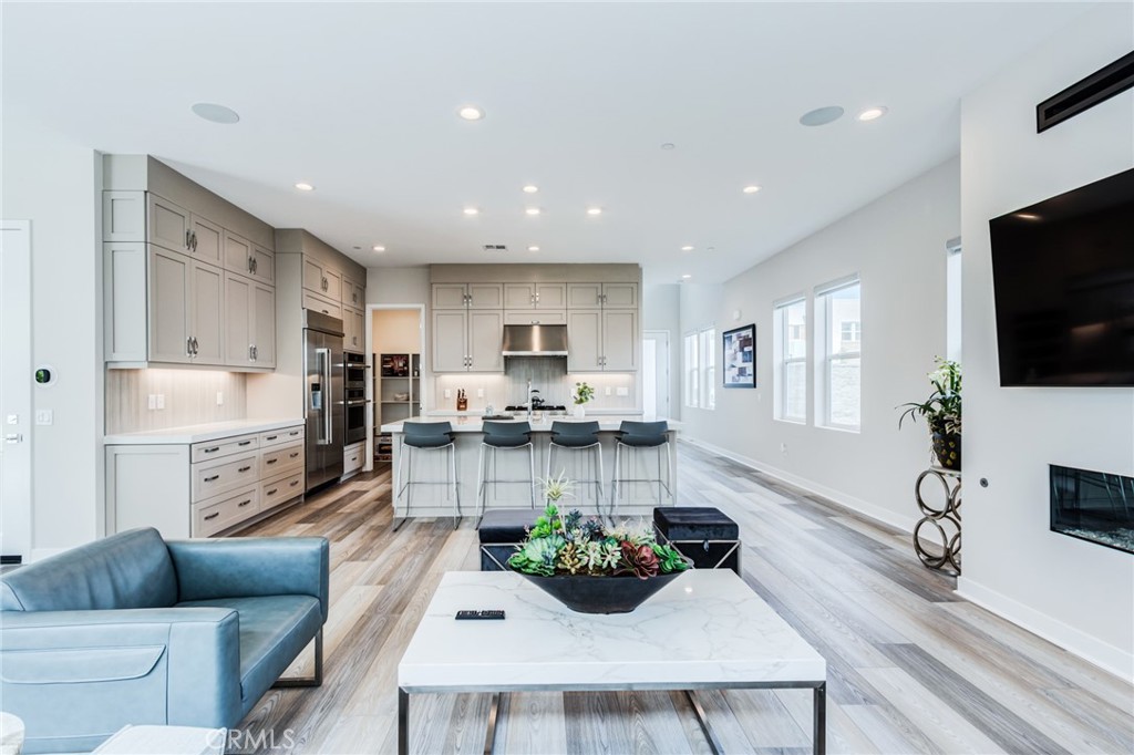 260 Holliston Lake Forest, CA 92630 - Photo 23 of 63 a living room with furniture and a flat screen tv