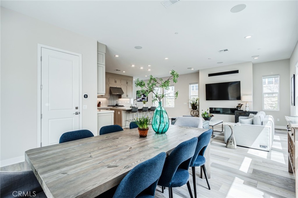 260 Holliston Lake Forest, CA 92630 - Photo 24 of 63 a view of a dining room with furniture and wooden floor