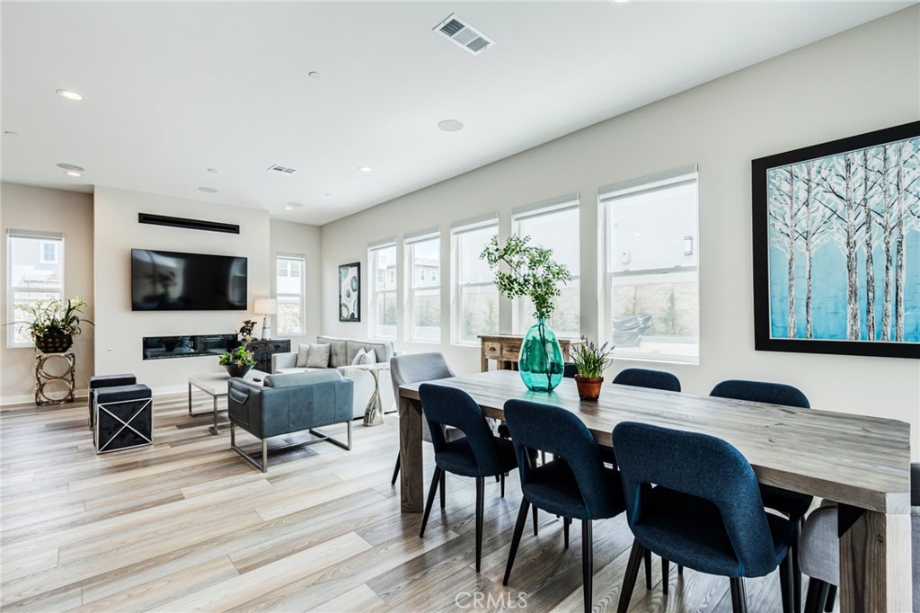 260 Holliston Lake Forest, CA 92630 - Photo 25 of 63 a view of a dining room with furniture window and wooden floor