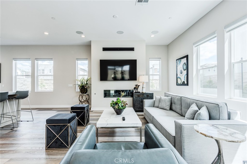 260 Holliston Lake Forest, CA 92630 - Photo 26 of 63 a living room with furniture and a flat screen tv