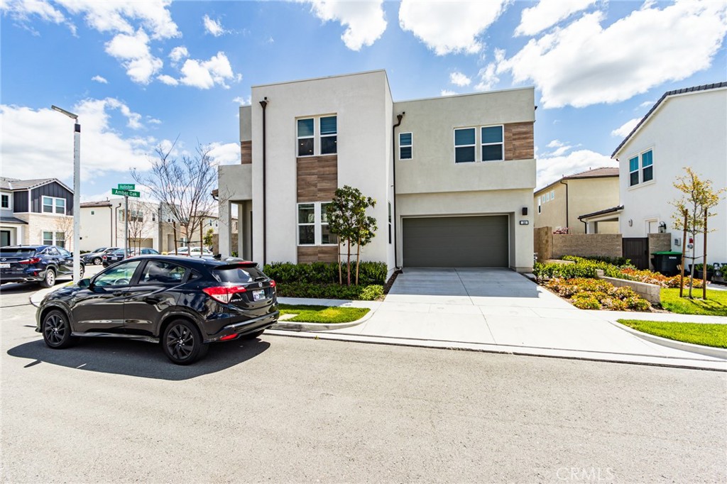 260 Holliston Lake Forest, CA 92630 - Photo 3 of 63 a view of a car parked in front of a buildings