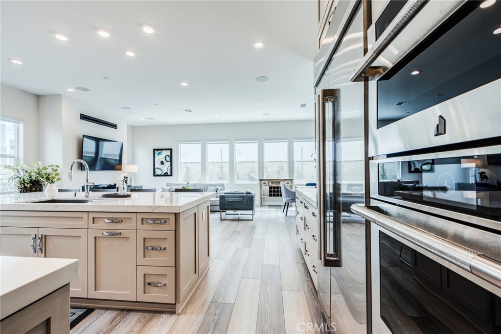 260 Holliston Lake Forest, CA 92630 - Photo 33 of 63 a kitchen with counter top space a sink and appliances