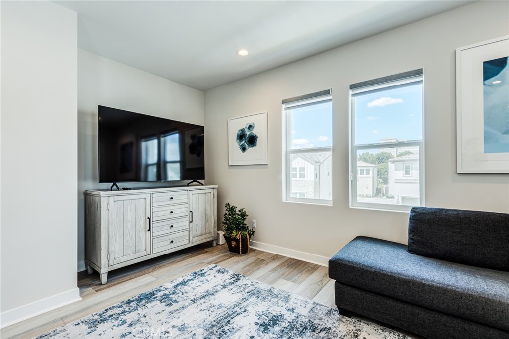 260 Holliston Lake Forest, CA 92630 - Photo 35 of 63 a living room with furniture and a flat screen tv
