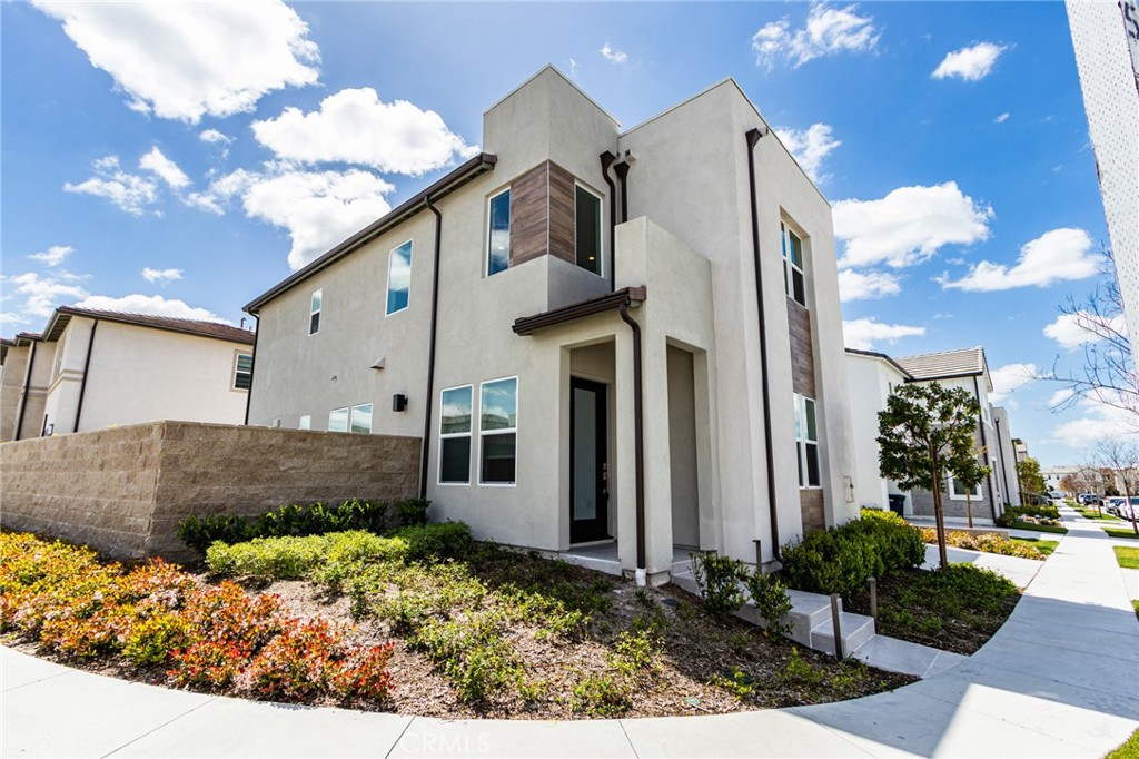 260 Holliston Lake Forest, CA 92630 - Photo 4 of 63 a front view of a house with a yard