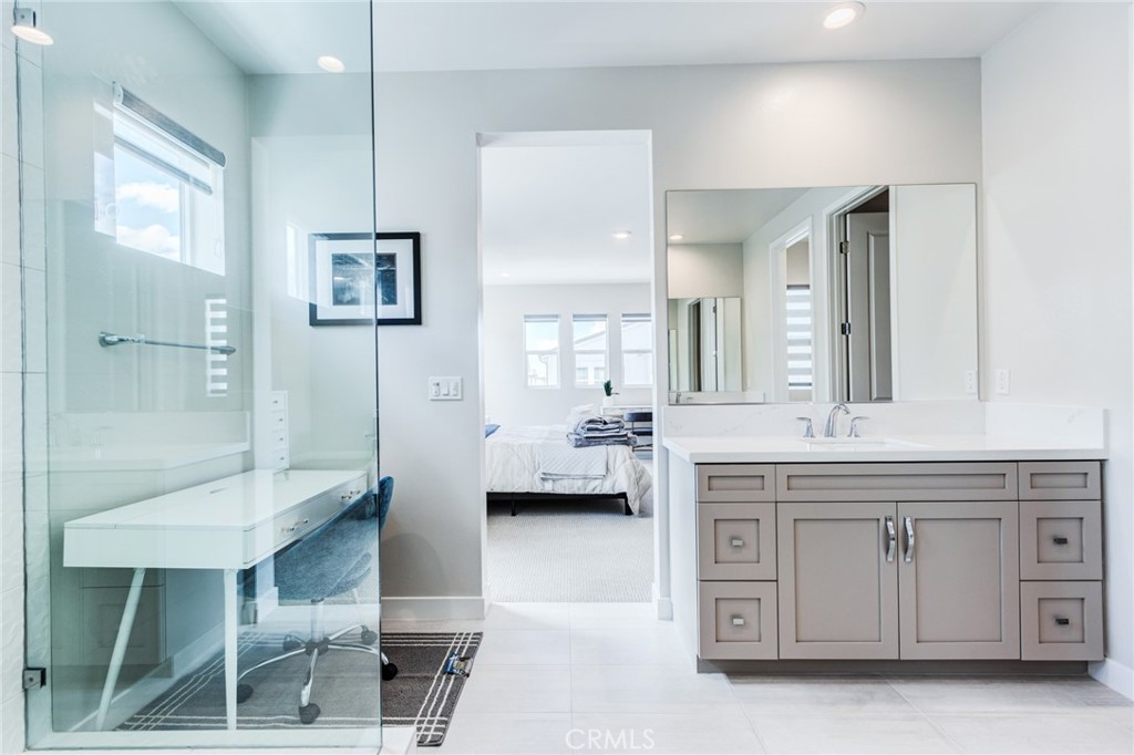 260 Holliston Lake Forest, CA 92630 - Photo 44 of 63 a spacious bathroom with a shower a sink and a mirror