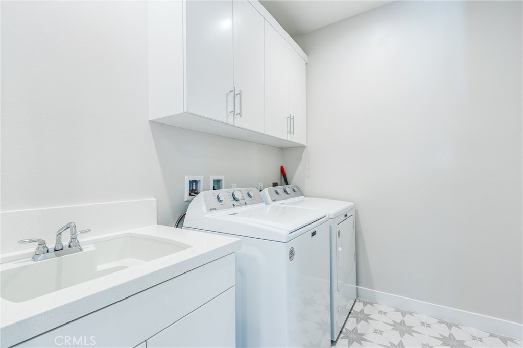 260 Holliston Lake Forest, CA 92630 - Photo 45 of 63 a utility room with dryer and washer