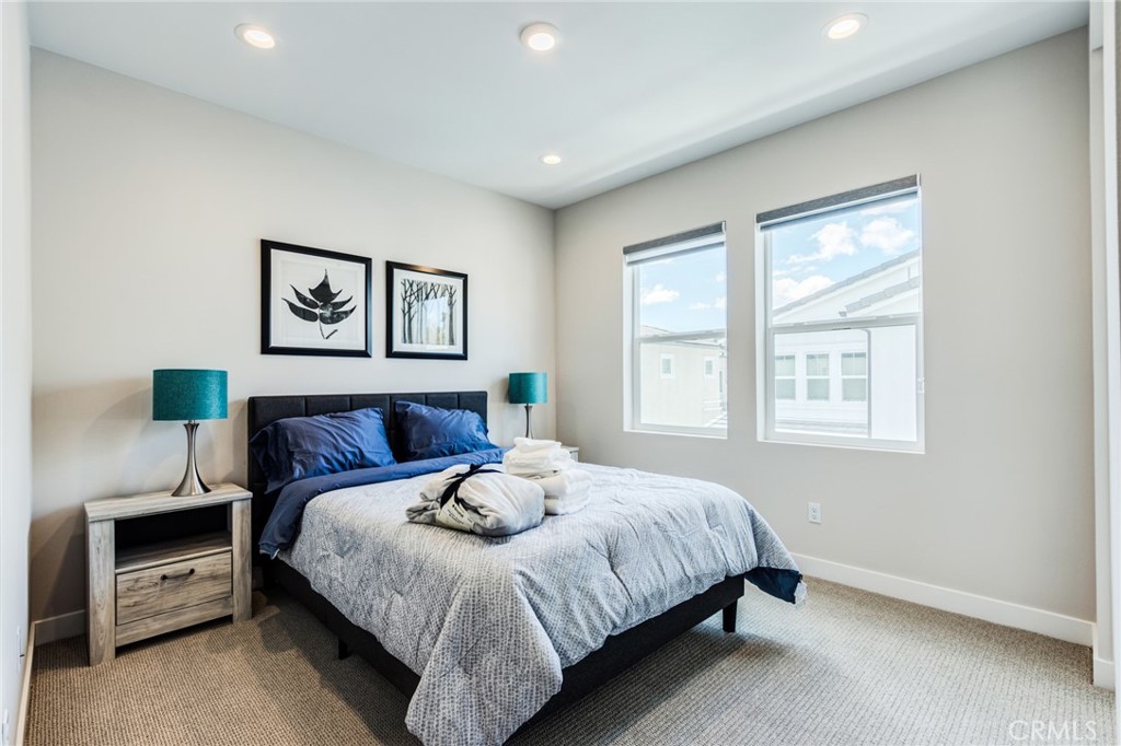 260 Holliston Lake Forest, CA 92630 - Photo 47 of 63 a bedroom with a large bed and a window