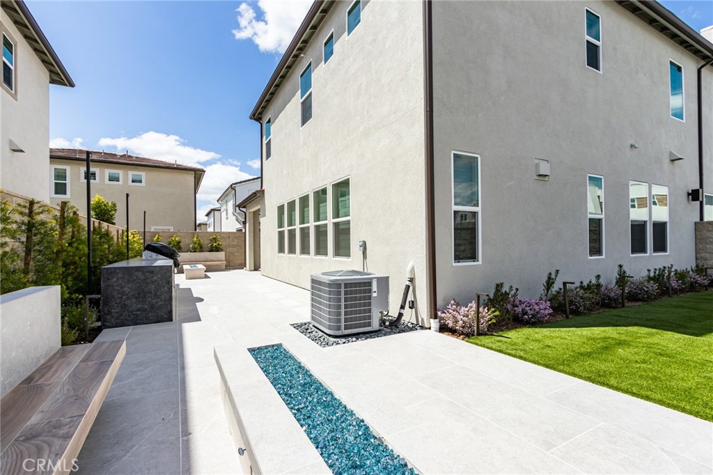 260 Holliston Lake Forest, CA 92630 - Photo 56 of 63 a front view of a house with garden