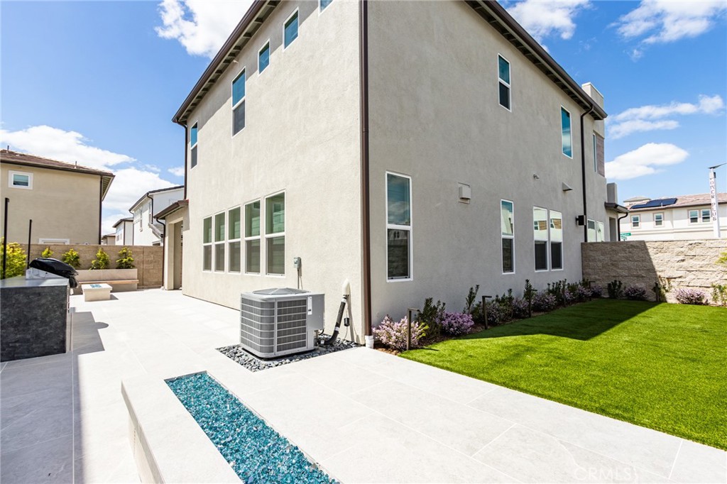 260 Holliston Lake Forest, CA 92630 - Photo 57 of 63 a front view of a house with garden