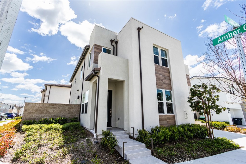 260 Holliston Lake Forest, CA 92630 - Photo 6 of 63 a front view of a house with garden