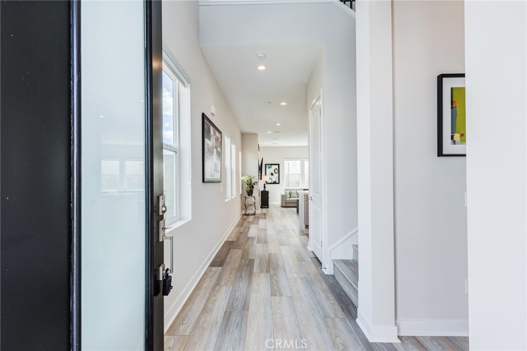 260 Holliston Lake Forest, CA 92630 - Photo 9 of 63 a view of hallway with wooden floor