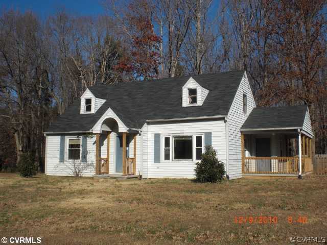 2088 Broad St Road Maidens, VA 23102 - Photo 1 of 9 a front view of a house with a garden