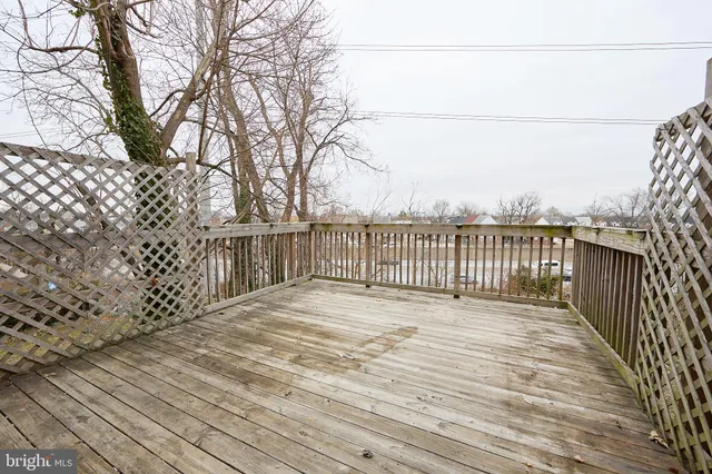a view of terrace with wooden floor and fence