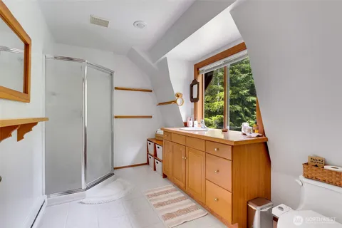 a kitchen with a cabinets and window
