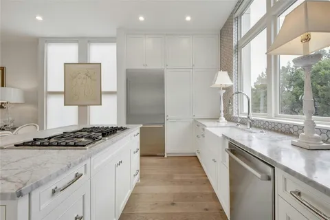 a bedroom with a bed and a view of bathroom