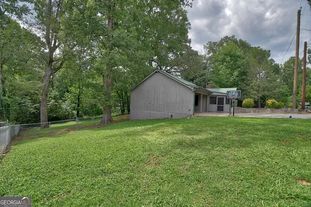 a house view with a garden space
