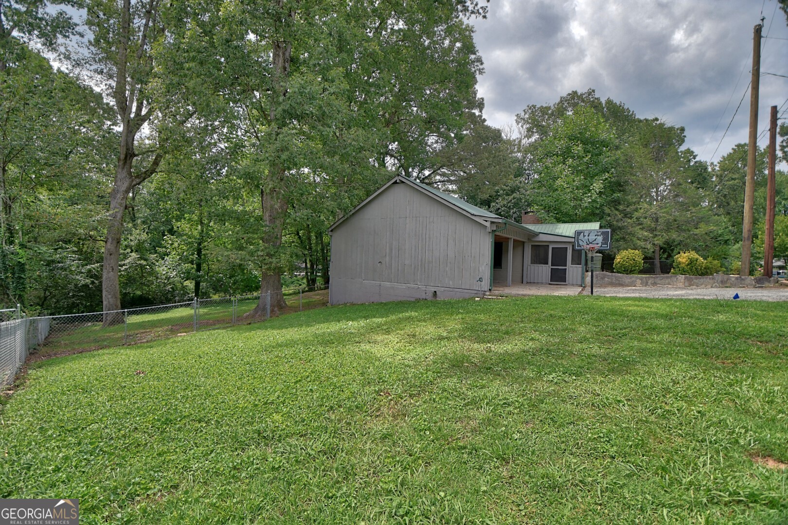 66 Post Oak Street Clayton, GA 30525 - Photo 3 of 17 a house view with a garden space