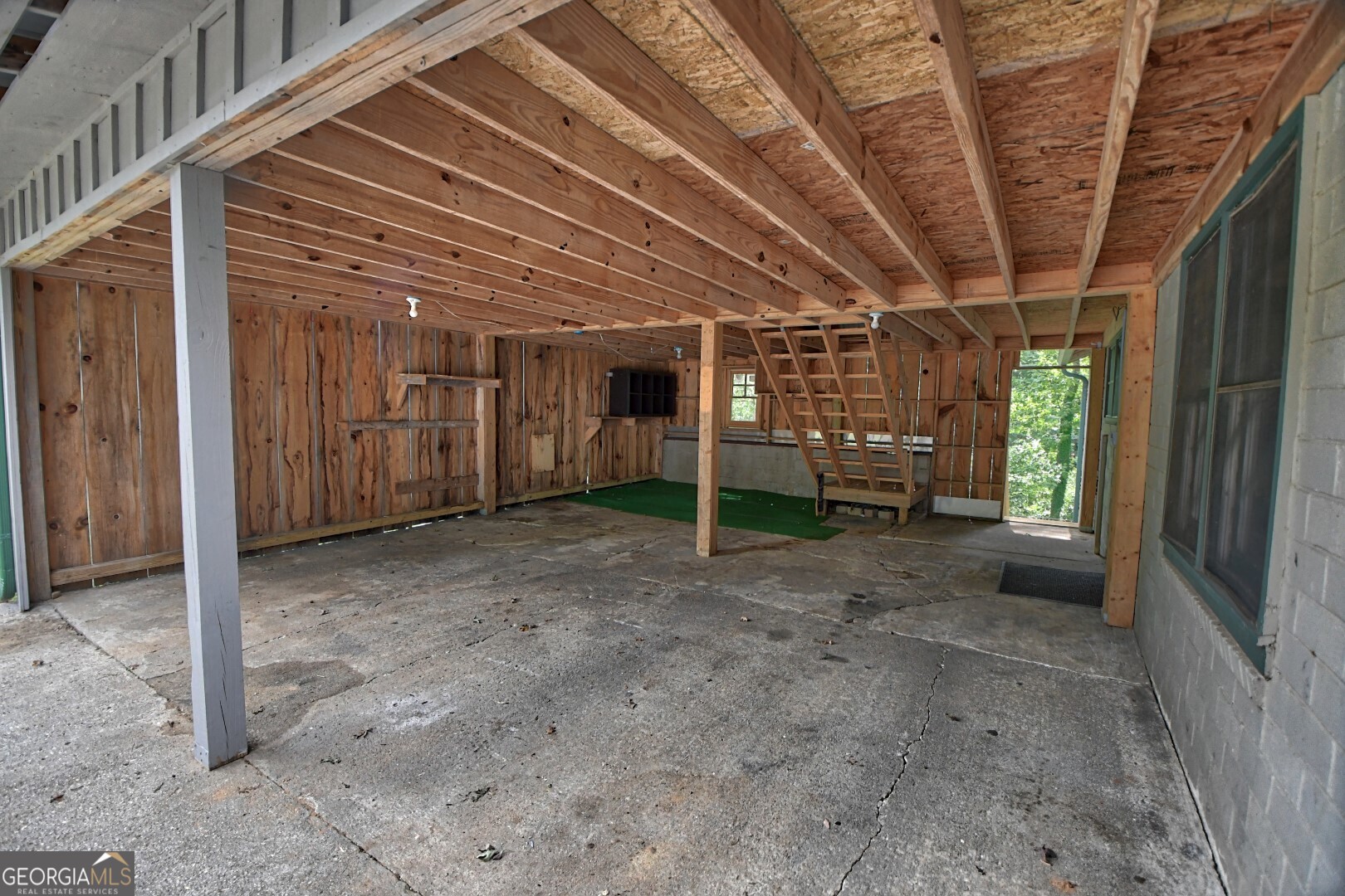 66 Post Oak Street Clayton, GA 30525 - Photo 4 of 17 a view of a porch with furniture