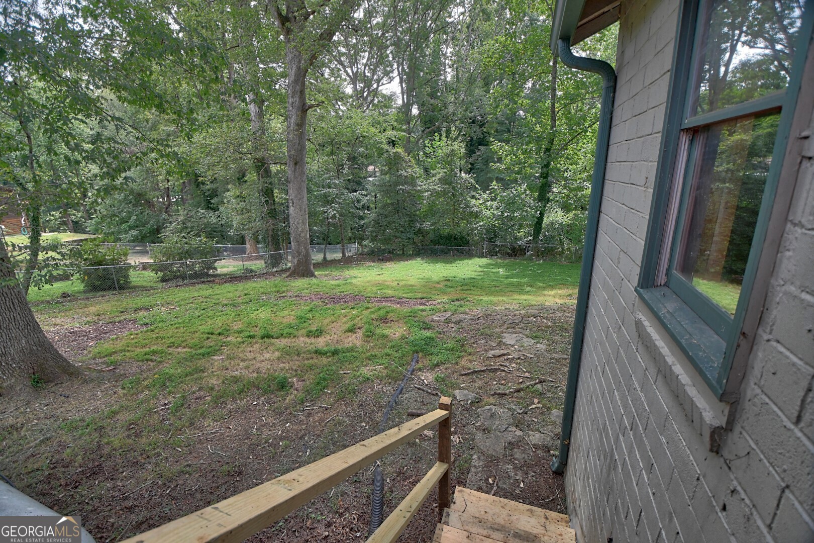 66 Post Oak Street Clayton, GA 30525 - Photo 5 of 17 a view of a yard from a balcony