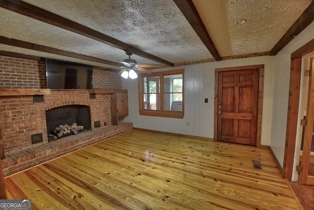 a view of a livingroom with a fireplace