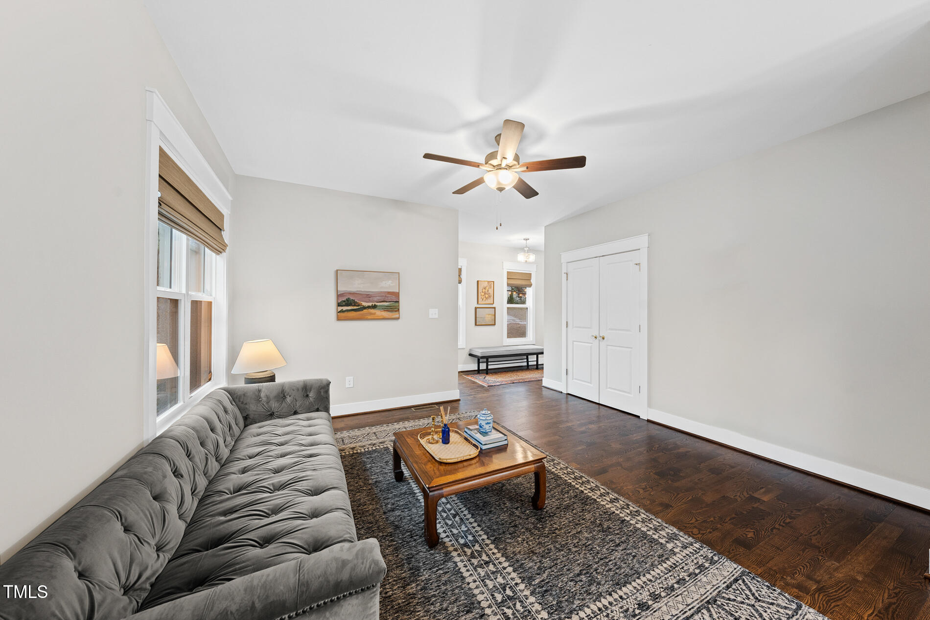2717 Newbold Street Raleigh, NC 27603 - Photo 5 of 29 a living room with furniture a rug and a window