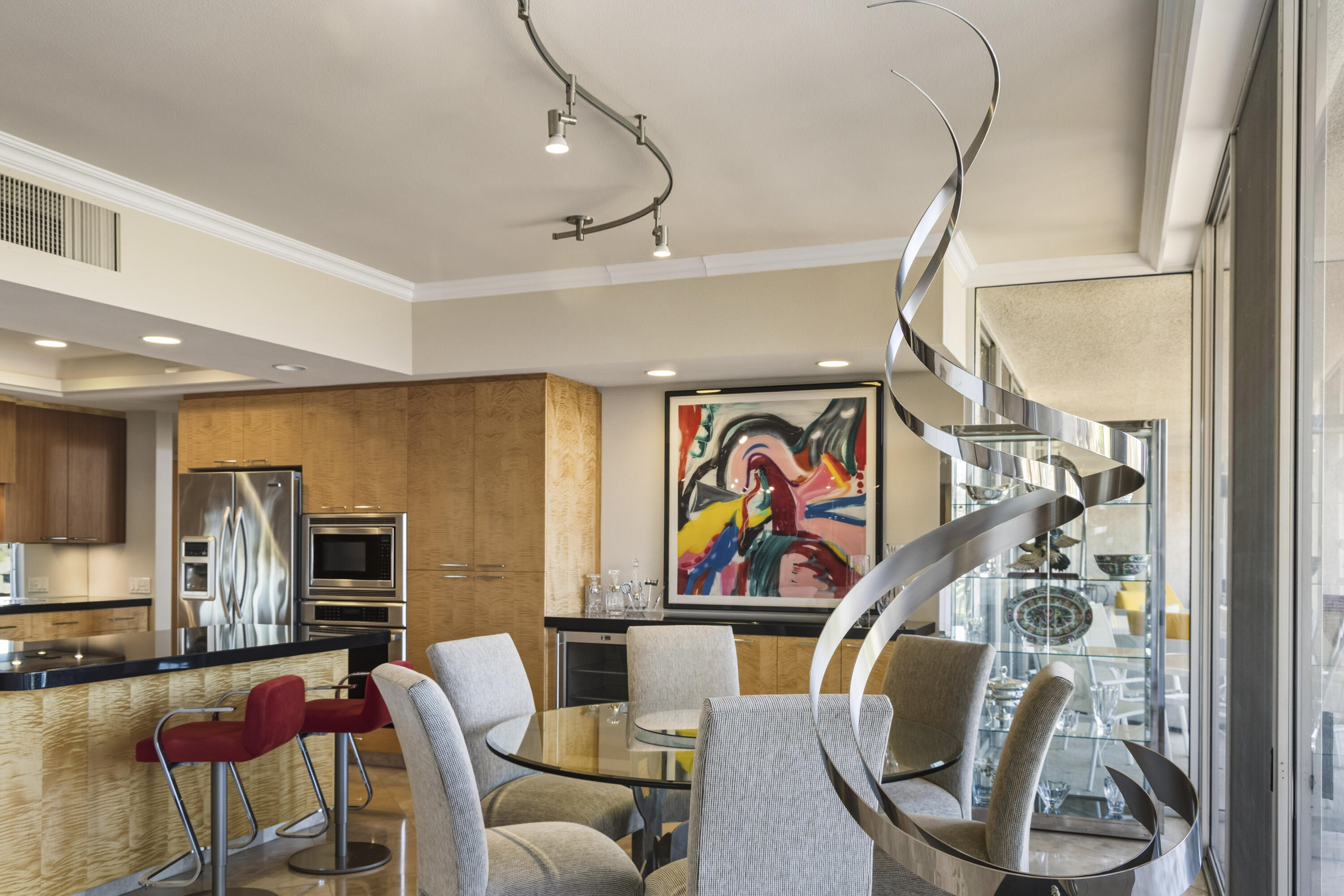 899 Island Drive, Unit 402 Rancho Mirage, CA 92270 - Photo 11 of 40 a view of a dining room with furniture