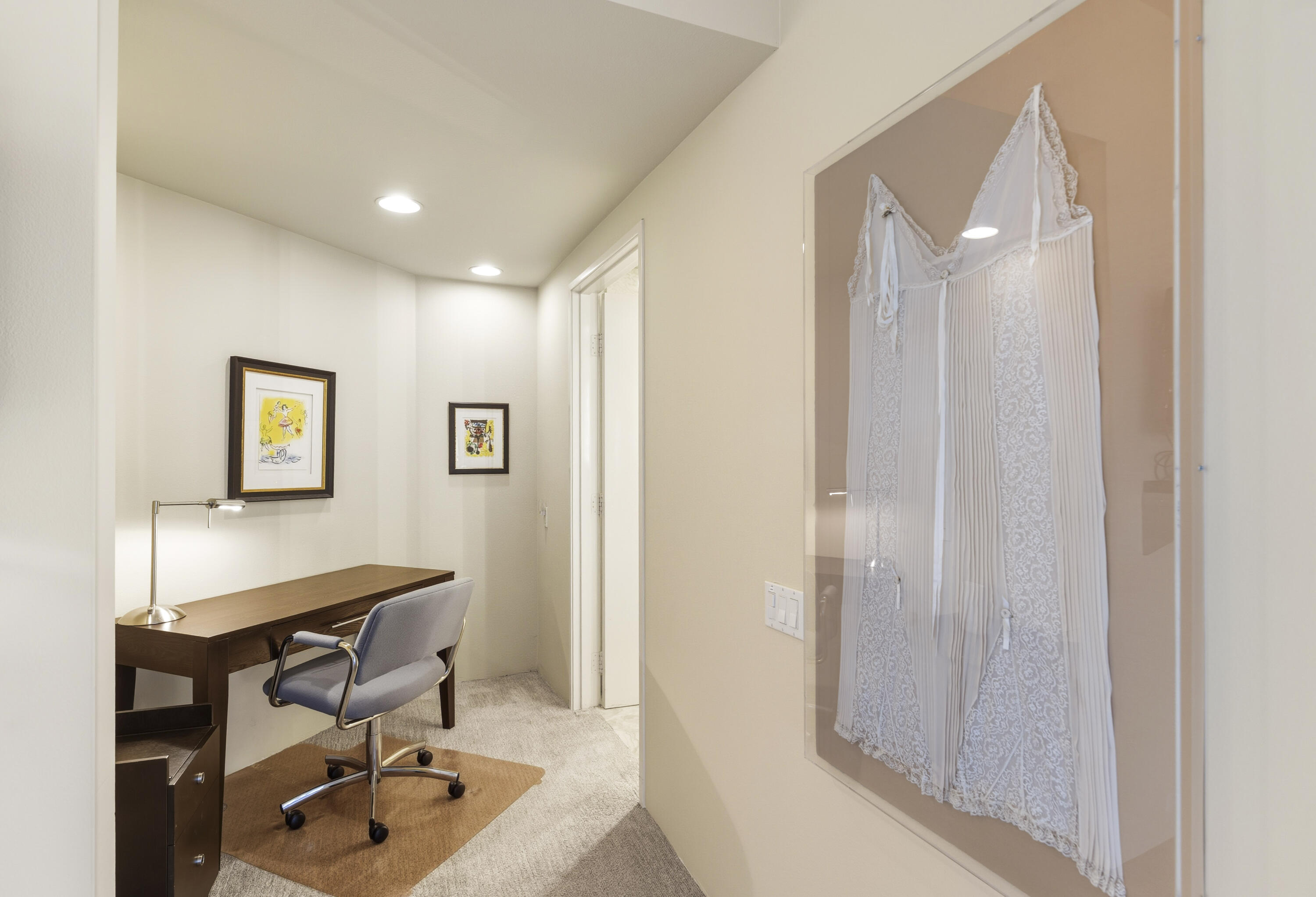 899 Island Drive, Unit 402 Rancho Mirage, CA 92270 - Photo 17 of 40 a view of a hallway with workspace and a window