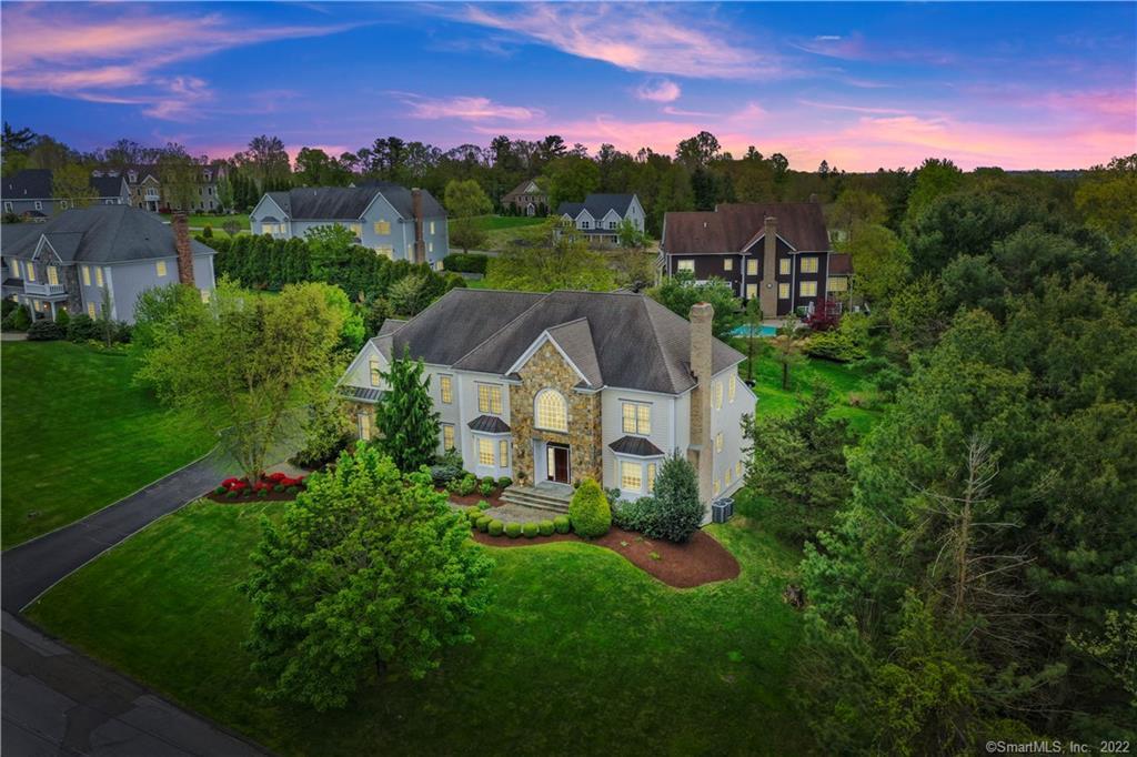 47 Under Cliff Road Trumbull, CT 06611 - Photo 1 of 1 a view of a big house with a big yard