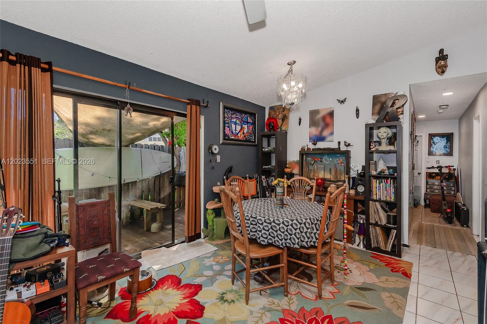 11482 Southwest 109th Road, Unit 29A Miami, FL 33176 - Photo 5 of 28 a outdoor dining space with furniture and rug