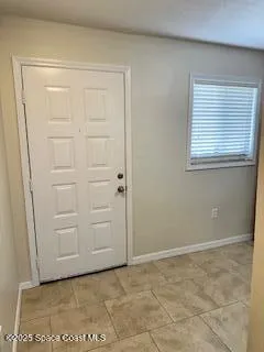 an empty room with cabinet