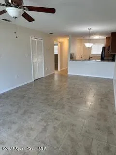 a view of a livingroom with a staircase