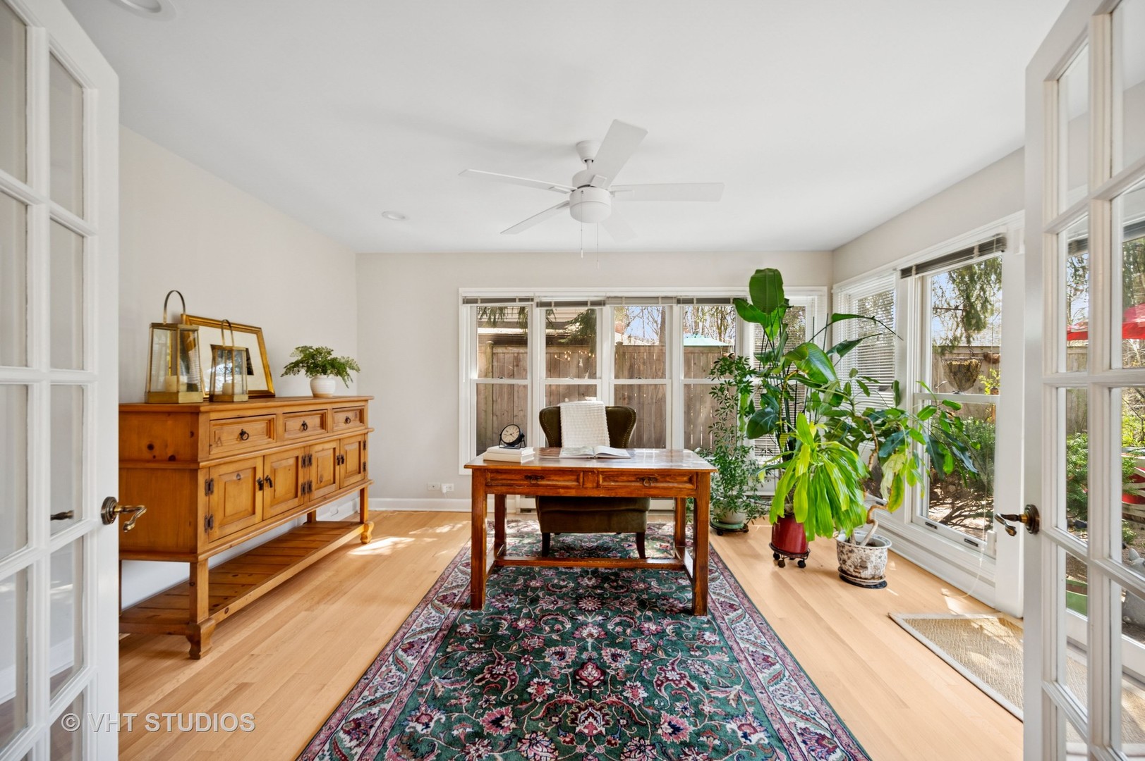 630 Juniper Road Glenview, IL 60025 - Photo 12 of 52 a living room with furniture lamp and a potted plant