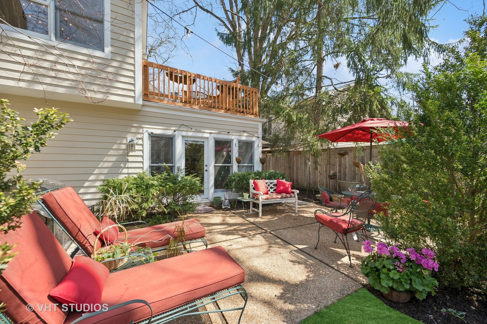 630 Juniper Road Glenview, IL 60025 - Photo 14 of 52 a building outdoor space with patio furniture and potted plants