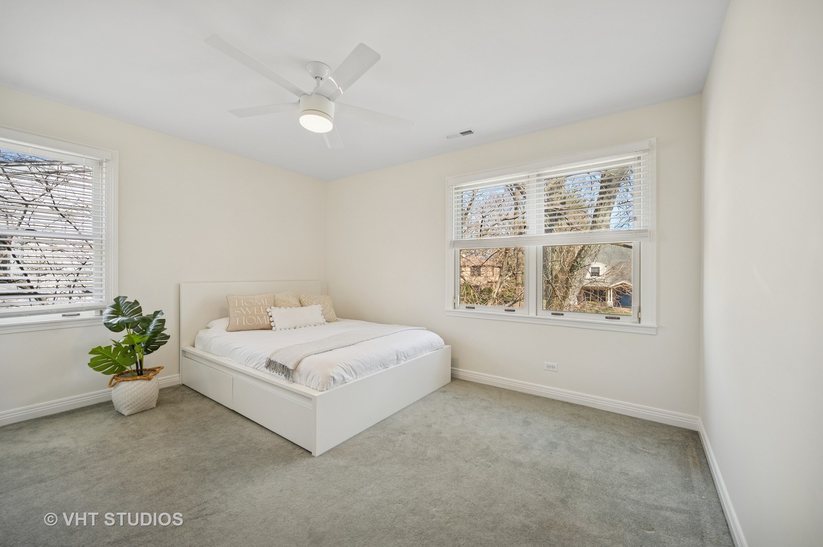 630 Juniper Road Glenview, IL 60025 - Photo 24 of 52 a white bed sitting in a bedroom next to a window