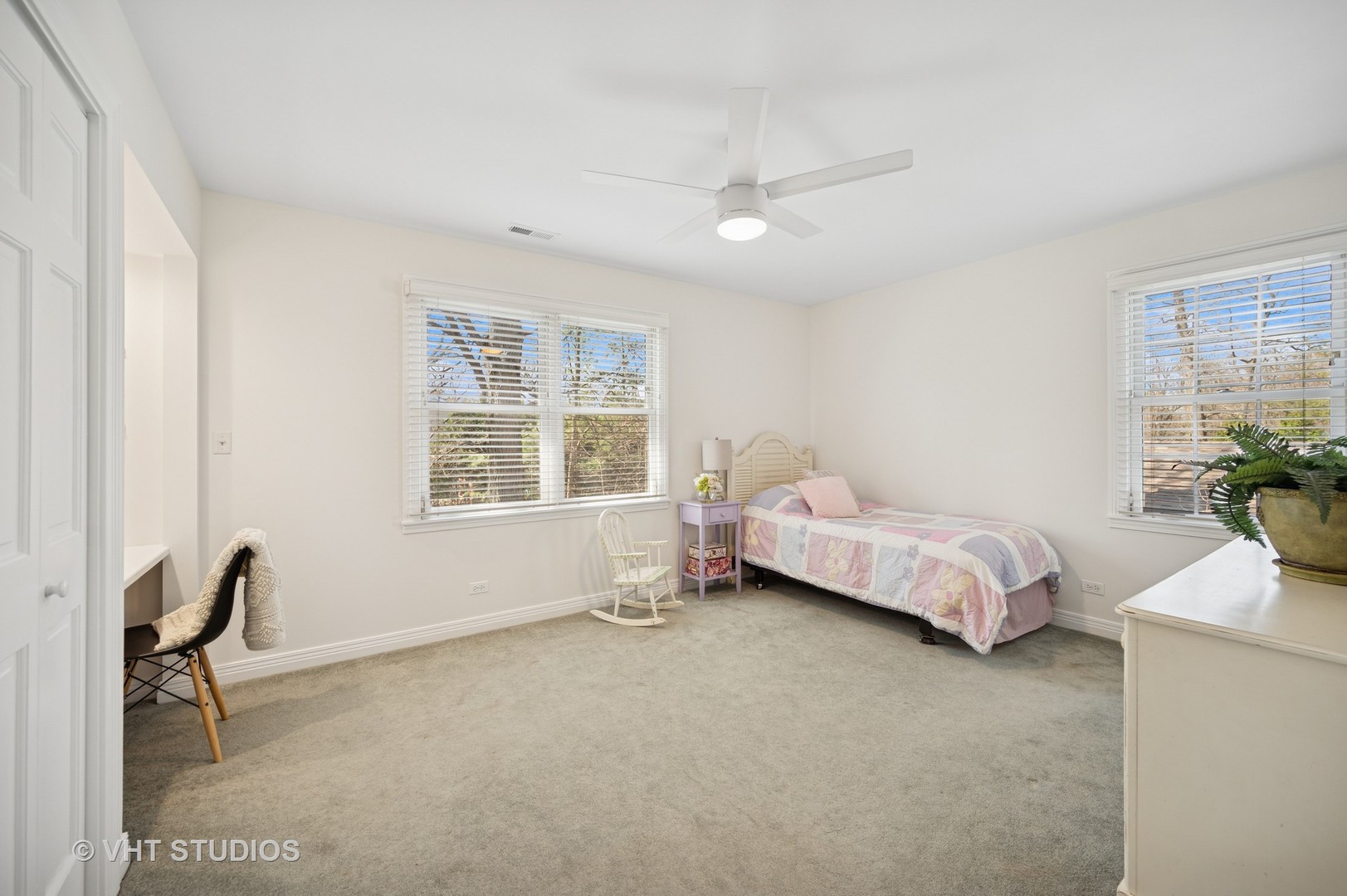 630 Juniper Road Glenview, IL 60025 - Photo 25 of 52 a bedroom with a bed and a window